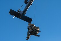 Davis-Monthan Pararescuemen are practicing a simulated rescue at Red Flag 23-1