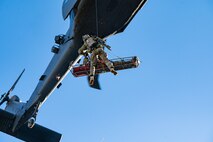 Davis-Monthan Pararescuemen are practicing a simulated rescue at Red Flag 23-1