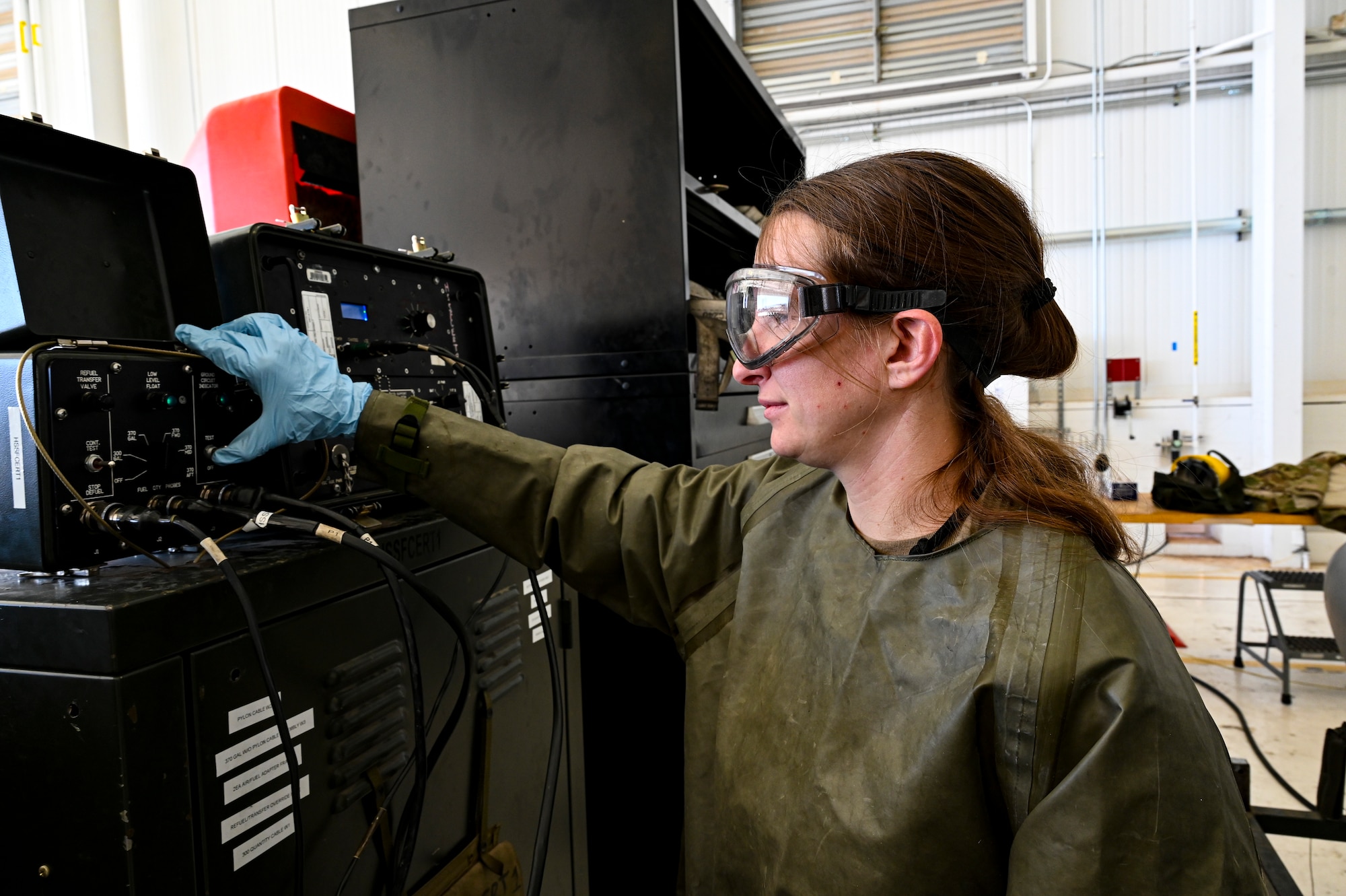U.S. Air Force Staff Sgt. Thelma Bradshaw, 49th Component Maintenance Squadron fuels craftsman, checks fuel levels of an F-16 Viper Holloman Air Force Base, New Mexico, Feb. 8, 2023. The 49th CMS fuels shop supplies fuel to approximately 100 F-16 Vipers on Holloman ensuring each one is mission-capable. (U.S. Air Force photo by Airman 1st Class Isaiah Pedrazzini)