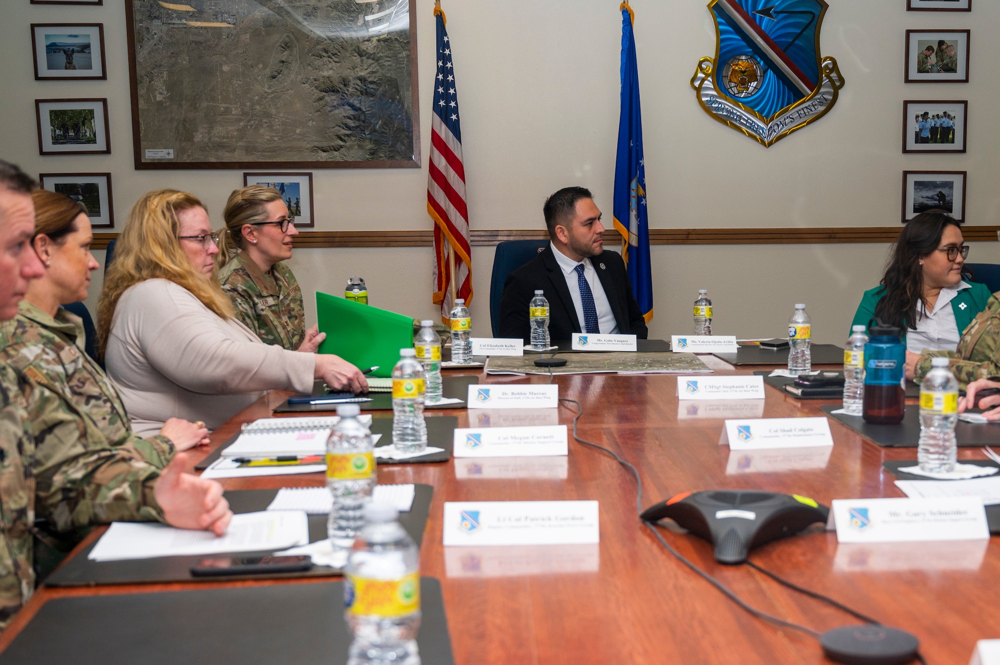 A group of people sit at a table.