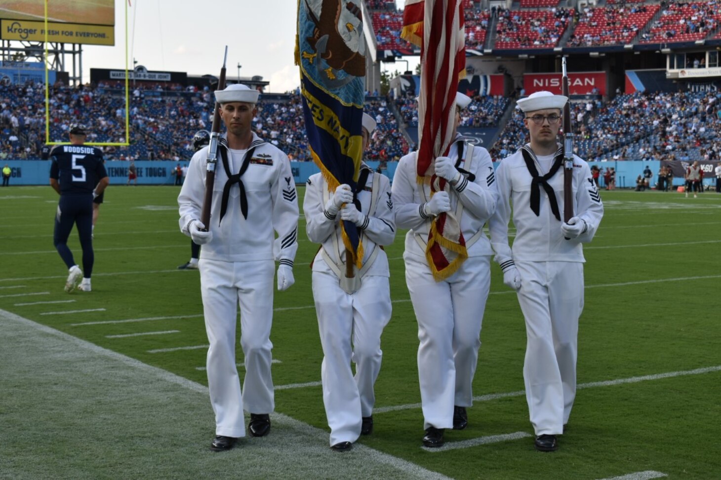NRC Nashville color guard performs at a Tennessee Titans game.