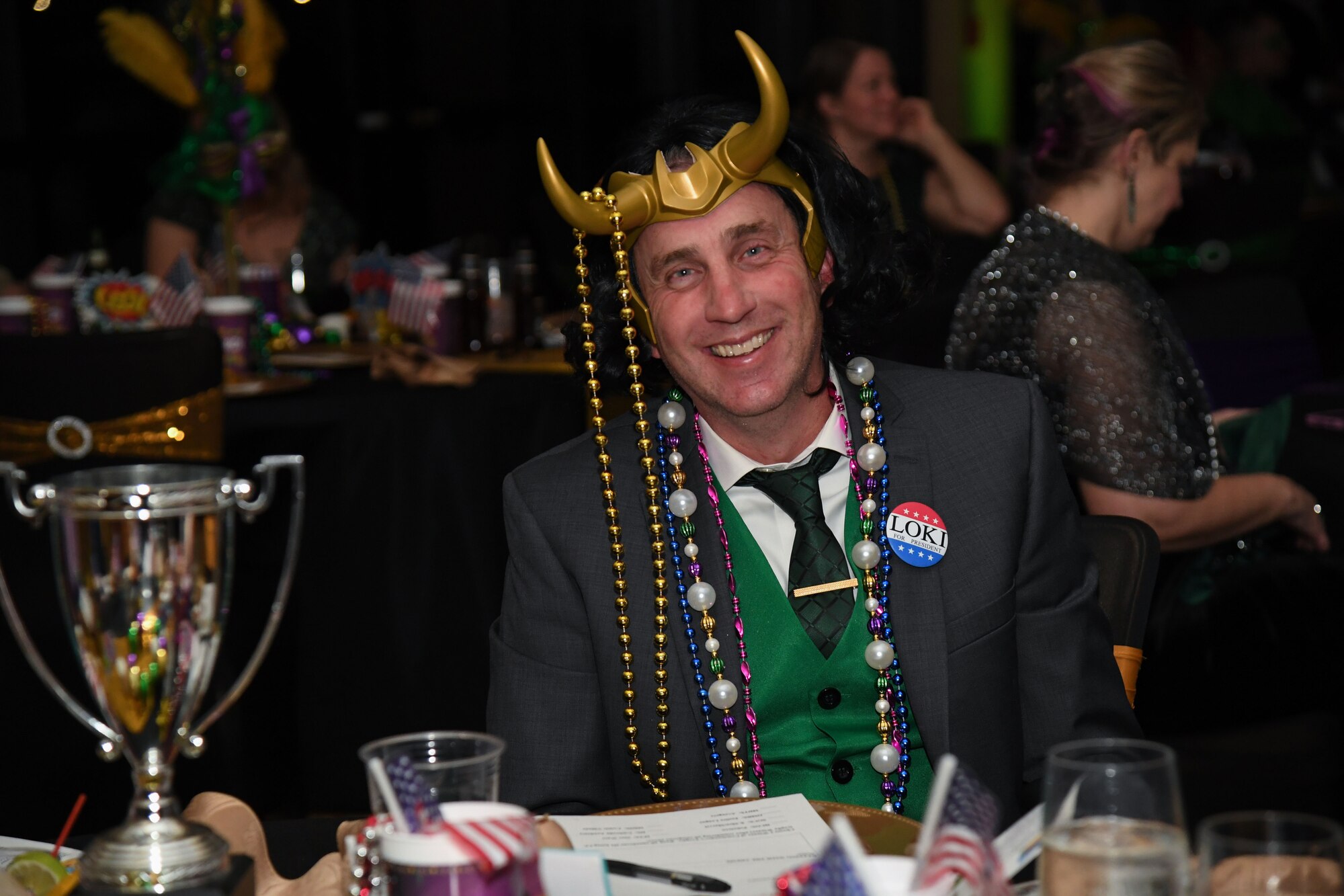U.S. Air Force Col. Christopher Estridge, 81st Medical Group commander, attends the 32nd Annual Krewe of Medics Mardi Gras Ball at the Bay Breeze Event Center on Keesler Air Force Base, Mississippi, Feb. 11, 2023.