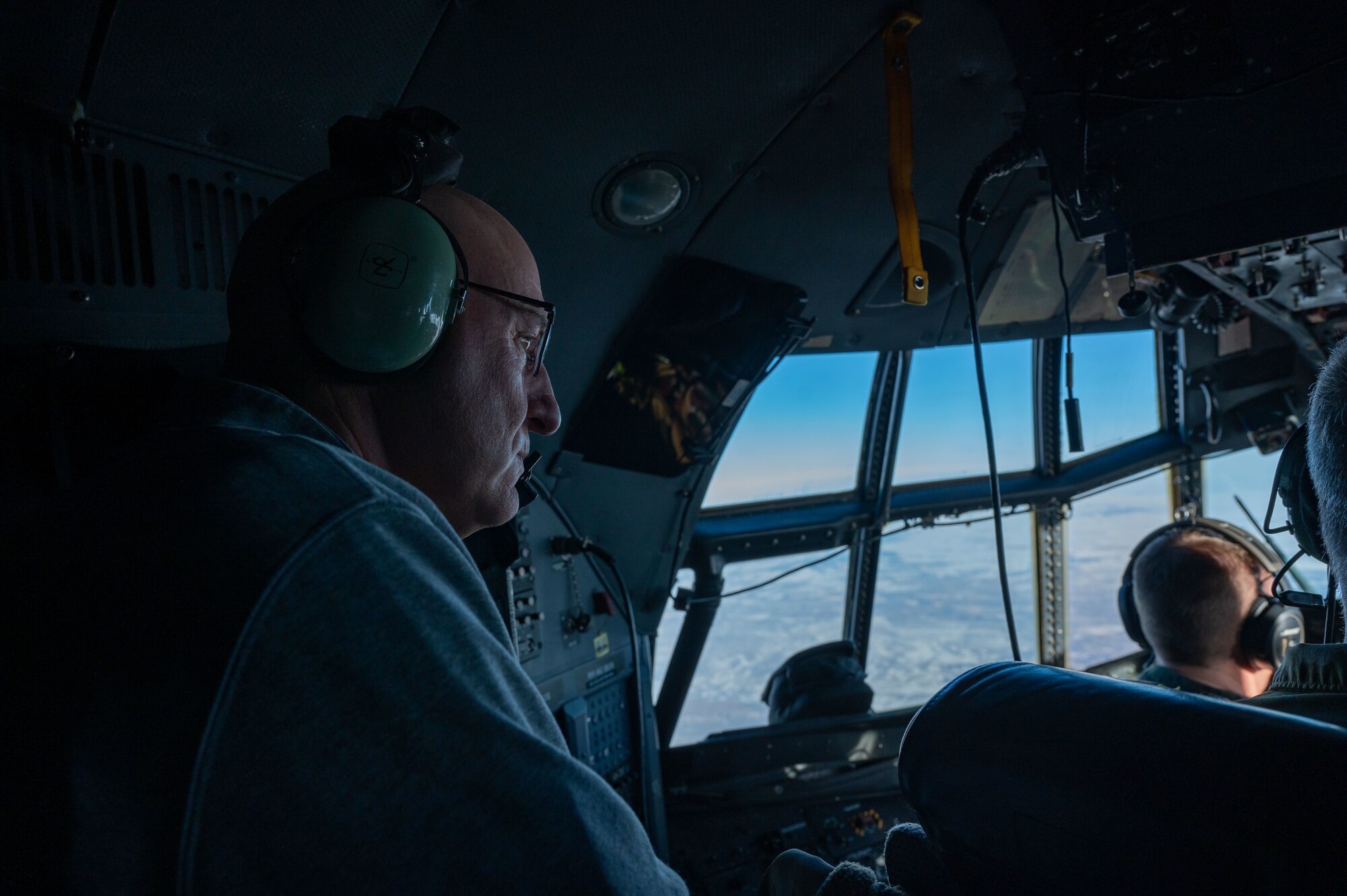 civic leader looks out cockpit