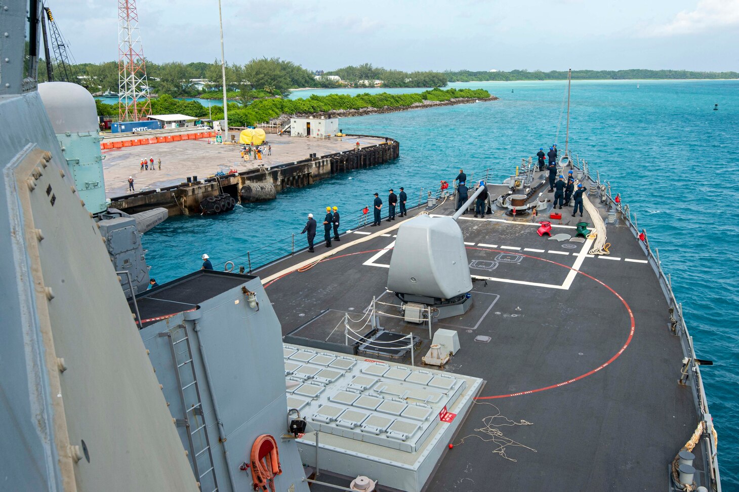 U.S. Navy Sailors man sea-and-anchor stations on the foc'scle of the Arleigh Burke-class guided-missile destroyer USS Paul Hamilton (DDG 60) during a routine port visit. Paul Hamilton, part of the Nimitz Carrier Strike Group, is in U.S. 7th Fleet conducting routine operations. 7th Fleet is the U.S. Navy’s largest forward-deployed numbered fleet, and routinely interacts and operates with Allies and partners in preserving a free and open Indo-Pacific region. (U.S. Navy photo by Mass Communication Specialist 2nd Class Elliot Schaudt)