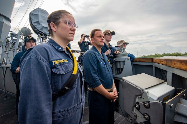 U.S. Navy Cmdr. Jake Ferrari, commanding officer of the Arleigh Burke-class guided-missile destroyer USS Paul Hamilton (DDG 60), oversees sea-and-anchor detail on the bridgewing of the Arleigh Burke-class guided-missile destroyer USS Paul Hamilton (DDG 60) during a routine port visit. Paul Hamilton, part of the Nimitz Carrier Strike Group, is in U.S. 7th Fleet conducting routine operations. 7th Fleet is the U.S. Navy’s largest forward-deployed numbered fleet, and routinely interacts and operates with Allies and partners in preserving a free and open Indo-Pacific region. (U.S. Navy photo by Mass Communication Specialist 2nd Class Elliot Schaudt)