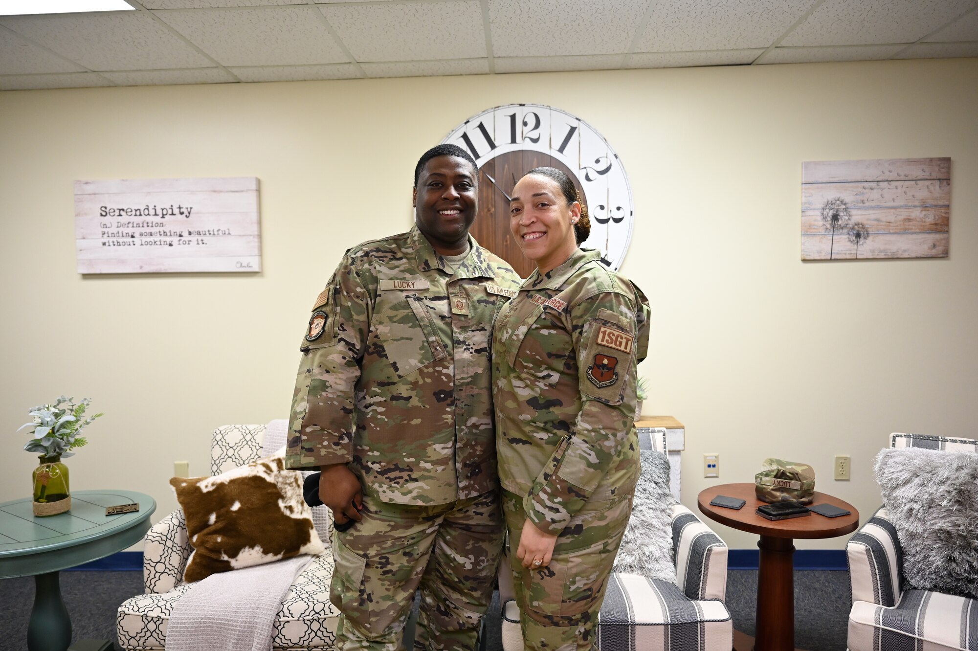 U.S. Air Force Master Sgt. Kelvin Lucky, 97th Security Forces Squadron operations superintendent, poses with his wife, Master Sgt. JaNiece Lucky, 97th Logistics Readiness Squadron first sergeant, in the Airmen Resiliency Center at Altus Air Force Base, Oklahoma, Feb. 10, 2023. Kelvin and JaNiece met in 2006 at Kirtland Air Force Base, New Mexico, during security forces training and were married in 2009. (U.S. Air Force photo by Airman 1st Class Kari Degraffenreed)