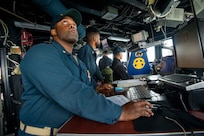 U.S. Navy Sailors man the quartermaster of the watch station on the bridge of the Arleigh Burke-class guided-missile destroyer USS Paul Hamilton (DDG 60) during a routine port visit. Paul Hamilton, part of the Nimitz Carrier Strike Group, is in U.S. 7th Fleet conducting routine operations. 7th Fleet is the U.S. Navy’s largest forward-deployed numbered fleet, and routinely interacts and operates with Allies and partners in preserving a free and open Indo-Pacific region. (U.S. Navy photo by Mass Communication Specialist 2nd Class Elliot Schaudt)