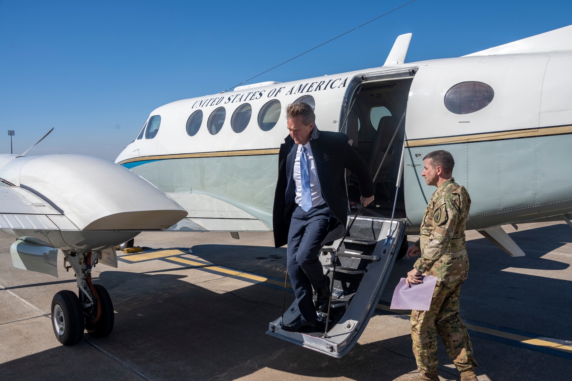 U.S. Ambassador Jeffry Flake, U.S. Ambassador to Türkiye, steps off an aircraft at Incirlik Air Base, Türkiye, Feb 13, 2023. Ambassador Flake visited Incirlik AB to discuss the recent earthquakes that struck central-southern Türkiye on Feb 6, 2023, and see the humanitarian support efforts first-hand. As Ambassador to Türkiye, Flake holds the highest civilian position as The Chief of Mission, and impacts the communication and resources of U.S. personnel, advancing the U.S. foreign policy goals. As a fellow NATO ally, the U.S. Government mobilized personnel to assist Türkiye in their response efforts. (U.S. Air Force photo by Senior Airman David D. McLoney)