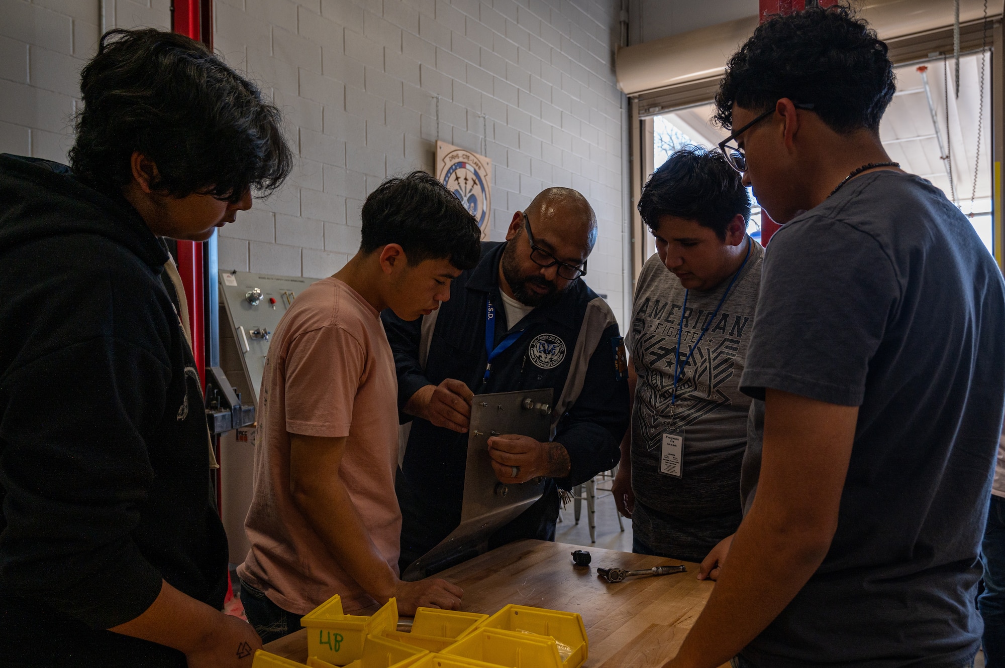 Joe Frank Ramirez, teacher at Del Rio’s Gerardo J. Maldonado Career & Technical Education, instructs first-year students on basic workshop skills on Feb. 9, 2023 at Del Rio’s Gerardo J. Maldonado Career & Technical Education Center. “It’s really about trying to give everyone a chance to learn more and be prepared and to help this next generation be ready for whatever they want to pursue,” said Ramiez. “But it all falls on them; what do they want to do, and are they willing to do the work to be off a little better.”(U.S. Air Force photo by Senior Airman David Phaff)