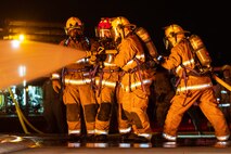 U.S. Marines with Aircraft Rescue and Firefighting practice responding to an aircraft fuel fire during an exercise on MCAS Miramar
