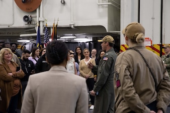 Capt. Patrick Baker, executive officer of the Nimitz-class aircraft carrier USS Abraham Lincoln (CVN 72), briefs Navy Office of Legislative Affairs (OLA) liaisons in the hangar bay. Navy OLA’s caseworker workshops help congressional caseworkers gain a greater understanding of Navy facilities, operations, and perspectives, and provide caseworkers the opportunity to tour ships, squadrons, or facilities; meet Sailors and leadership; and discuss various topics that affect constituent casework. (U.S. Navy photo by Mass Communications Specialist 3rd Class Jacqueline Orender)