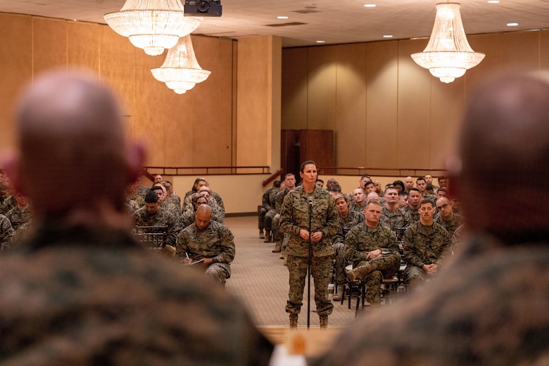 U.S. Marine Corps Master Gunnery Sgt. Chelsea E. Jones, logistics chief with 1st Marine Logistics Group, asks a question to Sgt. Maj. Troy E. Black, the 19th Sergeant Major of the Marine Corps, and fellow senior leaders during a staff noncommissioned officer senior leader panel at Marine Corps Base Camp Pendleton, California, Feb. 8, 2023. The Sergeant Major of the Marine Corps visited units across I Marine Expeditionary Force, speaking to Marines about talent management, force design, quality of life and the importance of maturing the force in the infantry. (U.S. Marine Corps photo by Cpl. Gabrielle Zagorski)