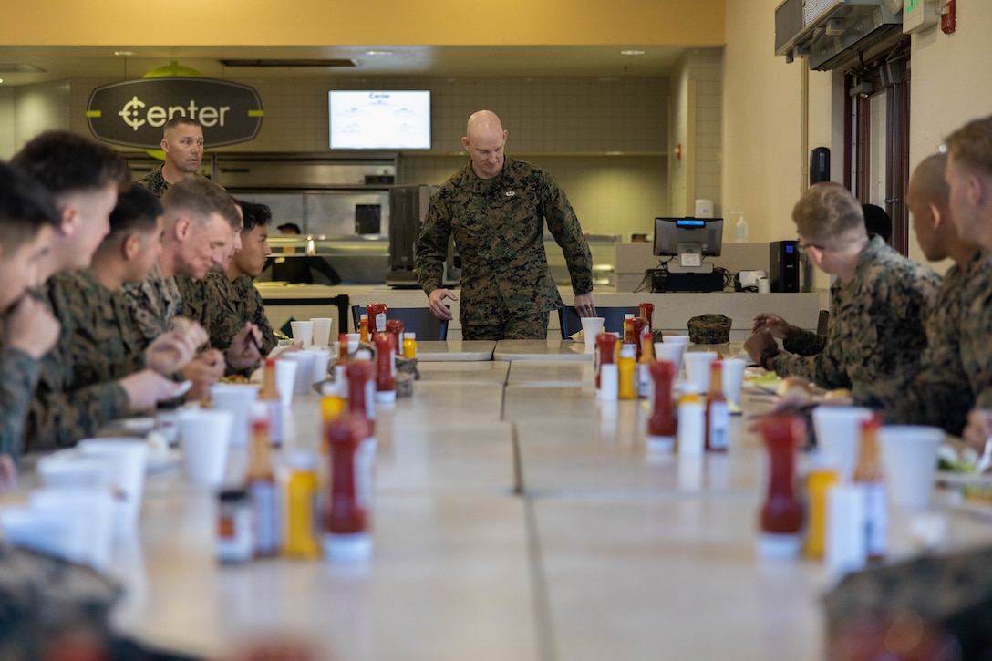 U.S. Marine Corps Sgt. Maj. Troy E. Black, the 19th Sergeant Major of the Marine Corps, joins noncommissioned officers assigned to 5th Marine Regiment, 1st Marine Division for lunch at the San Mateo chow hall during his visit to Marine Corps Base Camp Pendleton, California, Feb. 7, 2023. The Sergeant Major of the Marine Corps visited units across I Marine Expeditionary Force, speaking to Marines about talent management, force design, quality of life and the importance of maturing the force in the infantry. (U.S. Marine Corps photo by Lance Cpl. Fred Garcia)