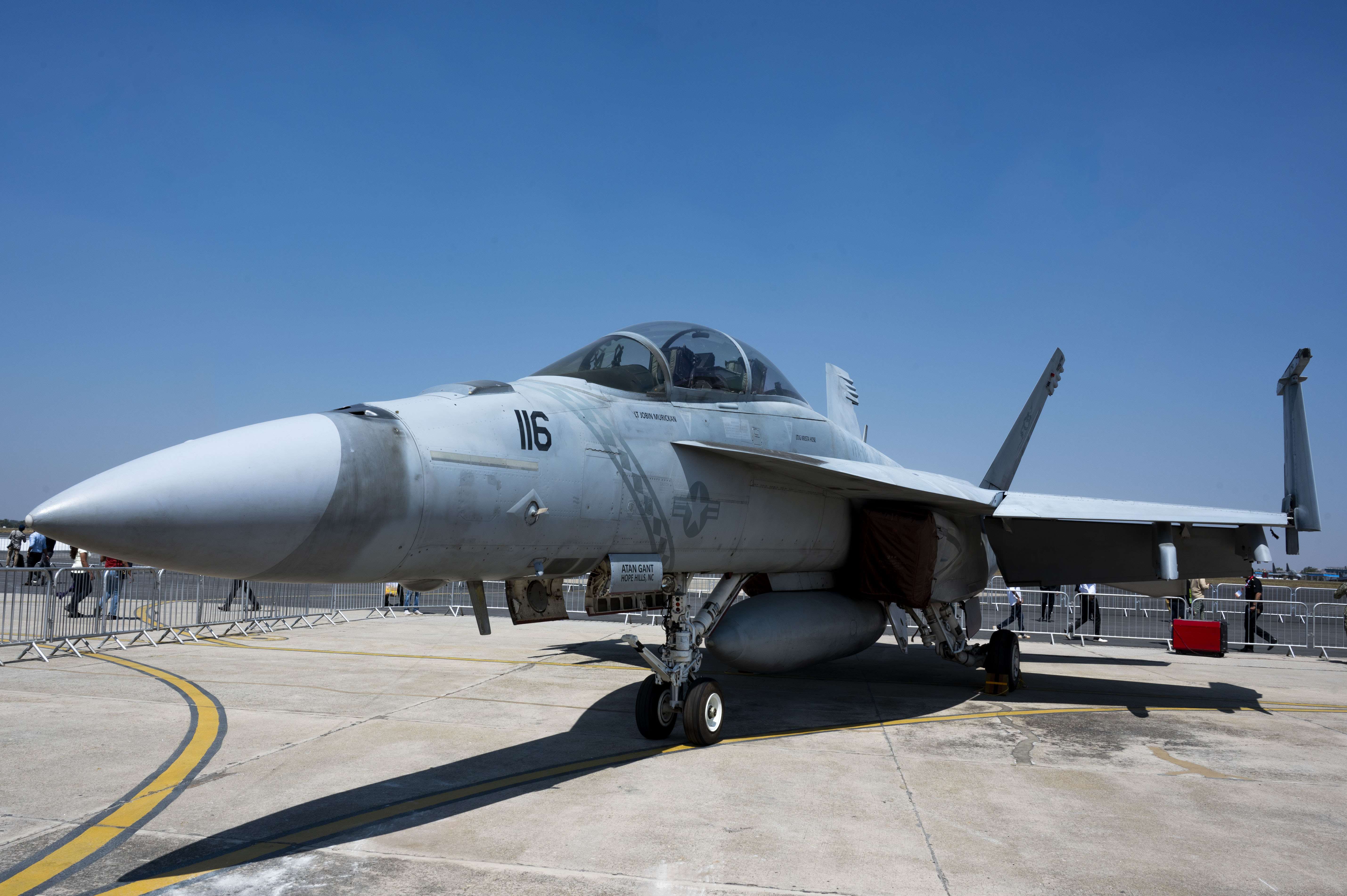 A U.S. Navy F/A-18 Super Hornet sits on display at Aero India 23 at Yelahanka Air Station, Bengaluru, India on Feb. 13, 2023. The U.S. military is participating in Aero India by providing aerial demonstrations and static aircraft to strengthen its partnership with India while furthering military-to-military relationships. (U.S. Air Force Photo by Airman 1st Class Emily Saxton)