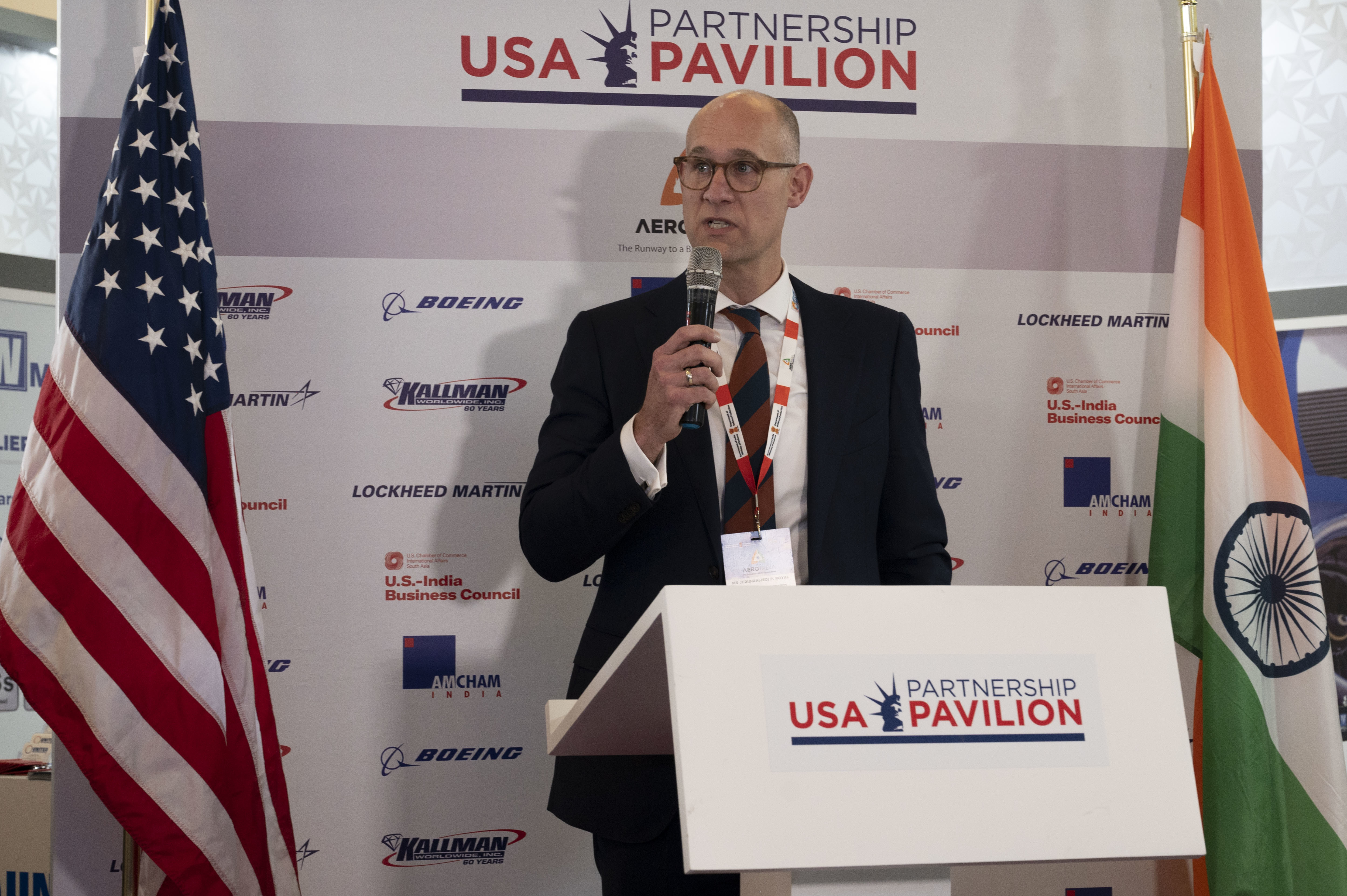 Principal deputy assistant secretary of defense for Indo-Pacific Security Affairs, Jedidiah Royal, makes remarks during the U.S. Pavilion opening ceremony during Aero India 23 at Yelahanka Air Station, Bengaluru, India on Feb. 13, 2023. The U.S. military is participating in Aero India by providing aerial demonstrations and static aircraft to strengthen its partnership with India while furthering military-to-military relationships. (U.S. Air Force Photo by Airman 1st Class Emily Saxton)