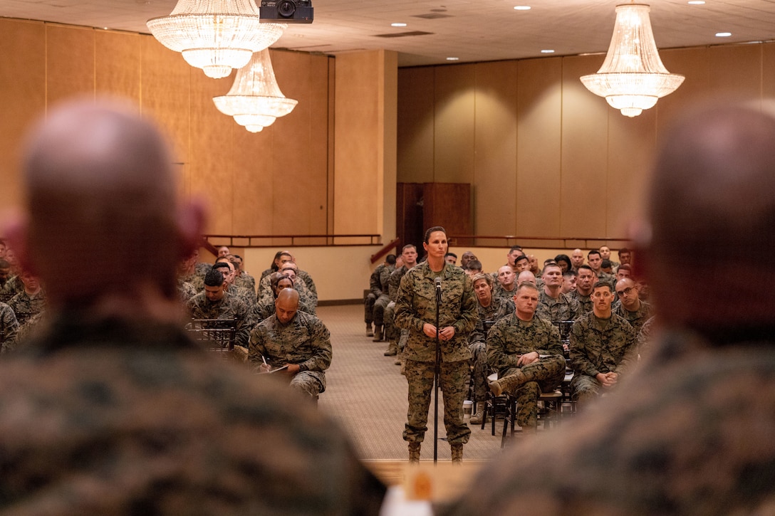 U.S. Marine Corps Master Gunnery Sgt. Chelsea E. Jones, logistics chief with 1st Marine Logistics Group, asks a question to Sgt. Maj. Troy E. Black, the 19th Sergeant Major of the Marine Corps, and fellow senior leaders during a staff noncommissioned officer senior leader panel at Marine Corps Base Camp Pendleton, California, Feb. 8, 2023. The Sergeant Major of the Marine Corps visited units across I Marine Expeditionary Force, speaking to Marines about talent management, force design, quality of life and the importance of maturing the force in the infantry. (U.S. Marine Corps photo by Cpl. Gabrielle Zagorski)