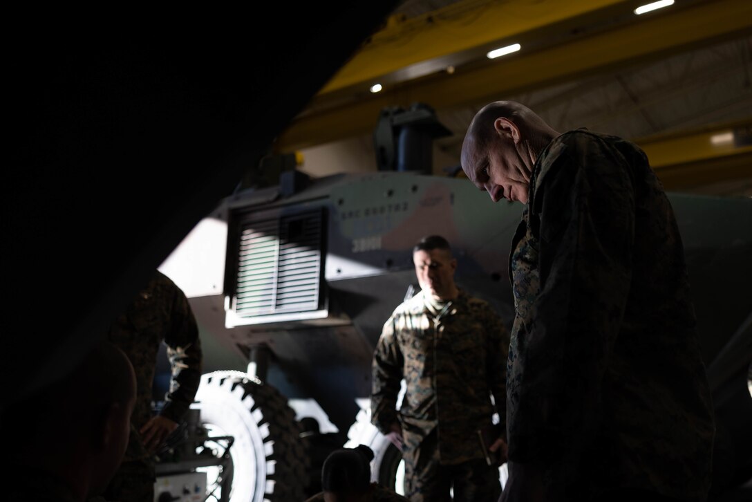 U.S. Marine Sgt. Maj. Troy E. Black, the sergeant major of the Marine Corps, talks with Marines from 3rd Assault Amphibian Battalion, 1st Marine Division, about the Amphibious Combat Vehicle during a visit to Marine Corps Base Camp Pendleton, California, Feb. 7, 2023. Black’s visit with Camp Pendleton units allows him to advocate for quality of life for the Marines at operational units whose focus is warfighting and training for warfighting. He also spoke with noncommissioned officers regarding the changes associated with Force Design 2030, and the training and education that will prepare them to lead Marines in a fight in the future. (U.S. Marine Corps photo by Lance Cpl. Juan Torres)