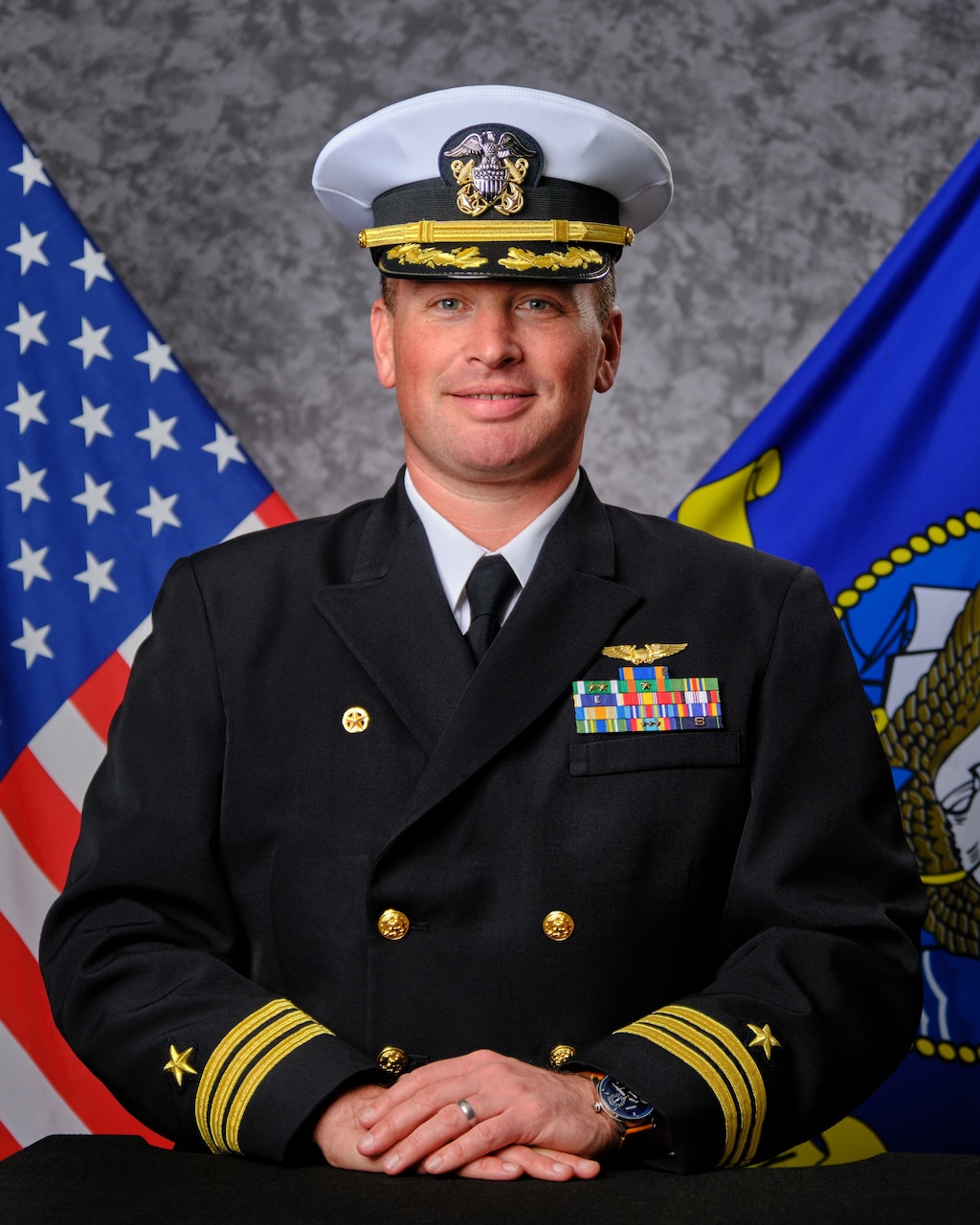 Official photo of CDR Maynes