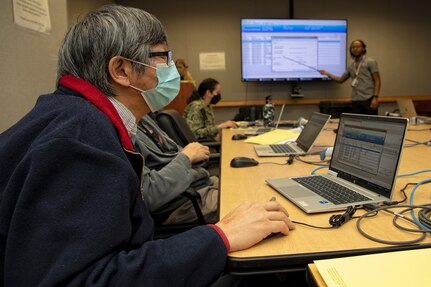 SILVER SPRING, Md. (Feb. 10, 2023) Dr. Hua Wei Chen, a research scientist with Naval Medical Research Center (NMRC), receives training for the Military Health System GENESIS. The training familiarizes clinicians and diagnostic lab personnel with the new military health record system, which will replace the legacy system when it goes live this Spring. In support of the Navy, Marine Corps, and joint U.S. warfighters, NMRC researchers study infectious diseases, biological warfare detection and defense, combat casualty care, environmental health concerns, aerospace and undersea medicine, medical modeling, simulation, operational mission support, epidemiology and behavioral sciences.  (U.S. Navy photo by Michael Wilson/Released)