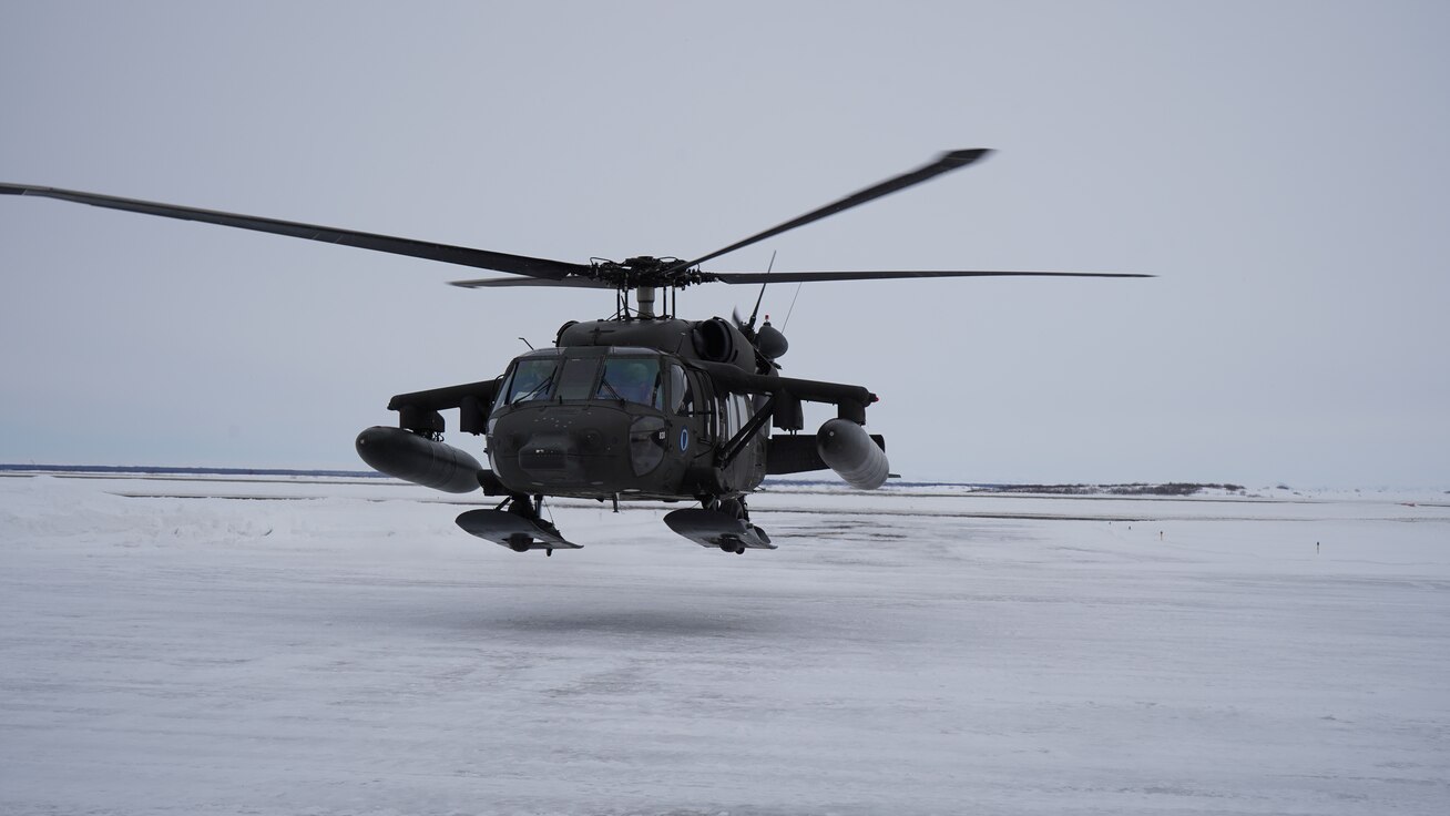 An Alaska Army National Guard UH-60L Black Hawk helicopter hovers near the aviation facility at the Bethel Airport after returning from a training flight.  The helicopter is stationed in Bethel for the time being to allow aircrews to train for federal mission requirements and become more familiar with the area.  The aircraft will be available to assist in emergency situations as requested by the Alaska Rescue Coordination Center or Alaska Emergency Operations Center and subject to aircrew availability.  (Alaska National Guard Photo by Dana Rosso)