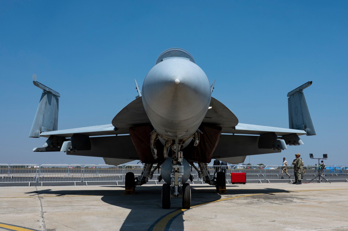 A U.S. Navy F/A-18 Super Hornet sits on display at Aero India 23 at Yelahanka Air Station, Bengaluru, India on Feb. 13, 2023. The U.S. military is participating in Aero India by providing aerial demonstrations and static aircraft to strengthen its partnership with India while furthering military-to-military relationships. (U.S. Air Force Photo by Airman 1st Class Emily Saxton)