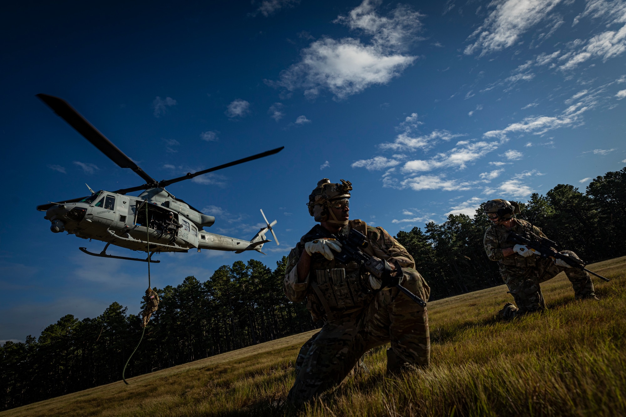Special Warfare Airmen with the New Jersey Air National Guard’s 227th Air Support Operations Squadron fast rope from a UH-1Y Venom helicopter with Marine Light Attack Helicopter Squadron 773 during training on Joint Base McGuire-Dix-Lakehurst, N.J., Oct. 10, 2019. (U.S. Air National Guard photo by Master Sgt. Matt Hecht)
