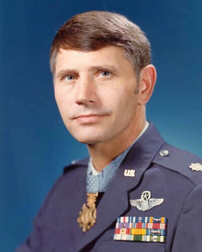 Airman posing for official photo