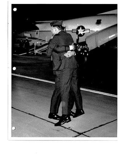 Airmen hugging
