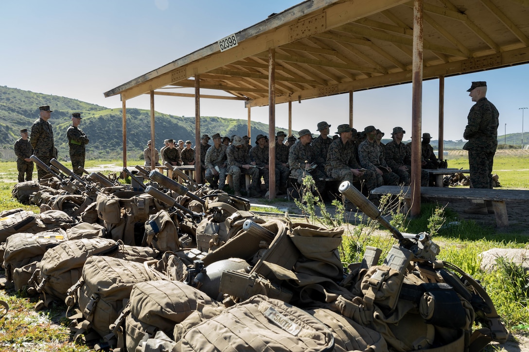 U.S. Marine Corps Sgt. Maj. Troy E. Black, the 19th Sergeant Major of the Marine Corps, addresses Marines from 2nd Battalion, 5th Marine Regiment, 1st Marine Division conducting advanced infantry training during his visit to Marine Corps Base Camp Pendleton, California, Feb. 7, 2023. The Sergeant Major of the Marine Corps visited units across I Marine Expeditionary Force, speaking to Marines about talent management, force design, quality of life and the importance of maturing the force in the infantry. (U.S. Marine Corps photo by Lance Cpl. Fred Garcia)