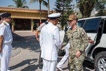 230215-N-EG592-2014 KARACHI, Pakistan (Feb. 15, 2023) Vice Adm. Brad Cooper, commander of U.S. Naval Forces Central Command, U.S. 5th Fleet and Combined Maritime Forces, shakes hands with Pakistan Navy Vice Adm. Ovais Ahmed Bilgrami in Karachi, Feb. 15, 2023.