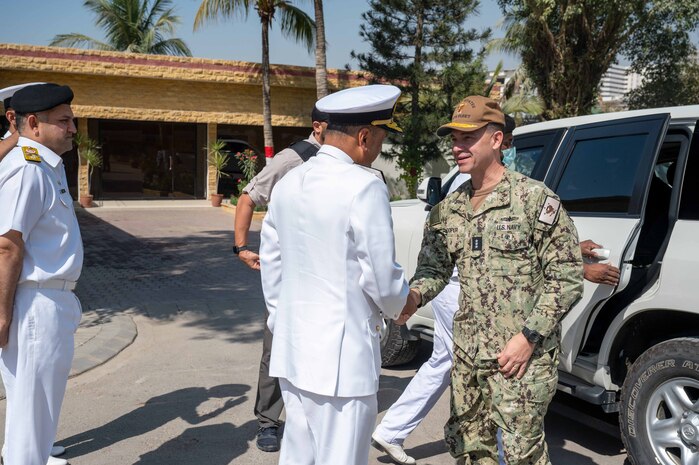 230215-N-EG592-2014 KARACHI, Pakistan (Feb. 15, 2023) Vice Adm. Brad Cooper, commander of U.S. Naval Forces Central Command, U.S. 5th Fleet and Combined Maritime Forces, shakes hands with Pakistan Navy Vice Adm. Ovais Ahmed Bilgrami in Karachi, Feb. 15, 2023.
