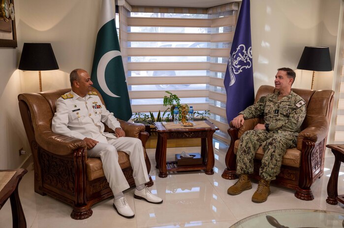 230215-N-EG592-2068 KARACHI, Pakistan (Feb. 15, 2023) Vice Adm. Brad Cooper, commander of U.S. Naval Forces Central Command (NAVCENT), U.S. 5th Fleet and Combined Maritime Forces, speaks with Pakistan Navy Vice Adm. Ovais Ahmed Bilgrami in Karachi, Feb. 15, 2023.