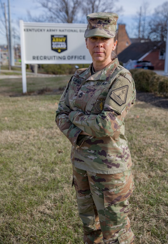 Kentucky Army National Guard Sgt. 1st Class Lori Lawson, a member of Bravo Company, Recruiting and Retention Battalion, poses for a photo at the Kentucky Army National Guard Recruiting and Retention headquarters building in Frankfort, Kentucky, on February 15, 2023. Lawson won Recruiter of the Year for the state and region for fiscal year 2022. (U.S. Army National Guard photo by Staff Sgt. Jeffrey Reno)