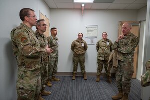Maj. Gen. Lutton tours the weapons generation facility.