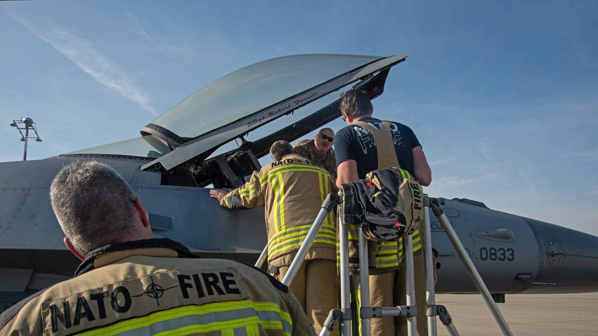 firefighters receive F-16 aircraft training.