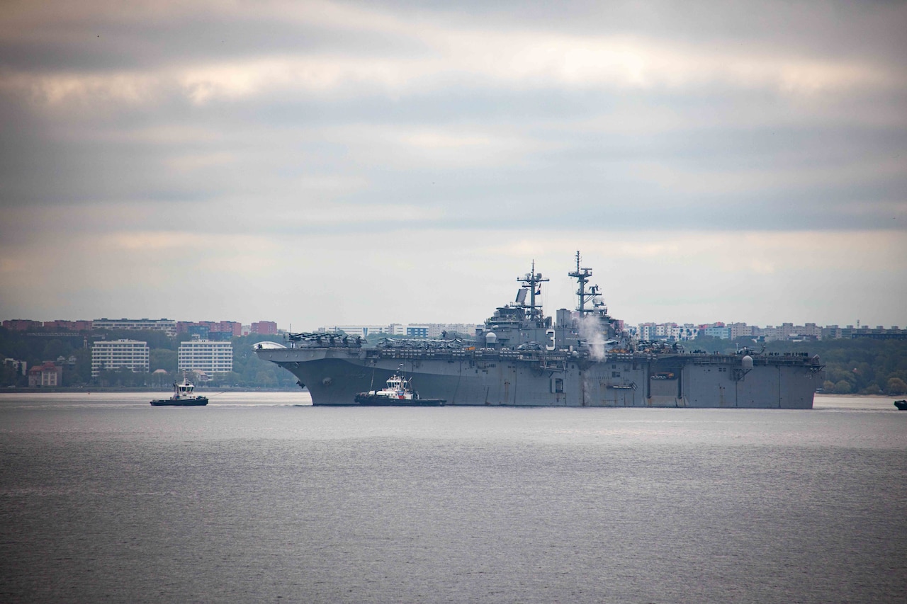 A ship approaches a port.