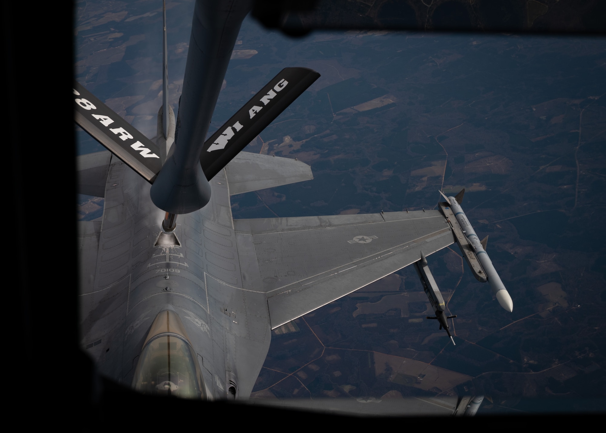 F-16C Fighting Falcon disconnects from a boom during flight operations