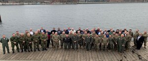 Military personnel from the United States, Denmark, Norway, Finland and Sweden pose for a photograph taken during a conference focused on sharing airspace information  in Copenhagen, Denmark in January 2023. The New York Air National Guard's 152nd Air Operations Group sent a delegation of three officers to the meeting. ( Courtesy Photo)