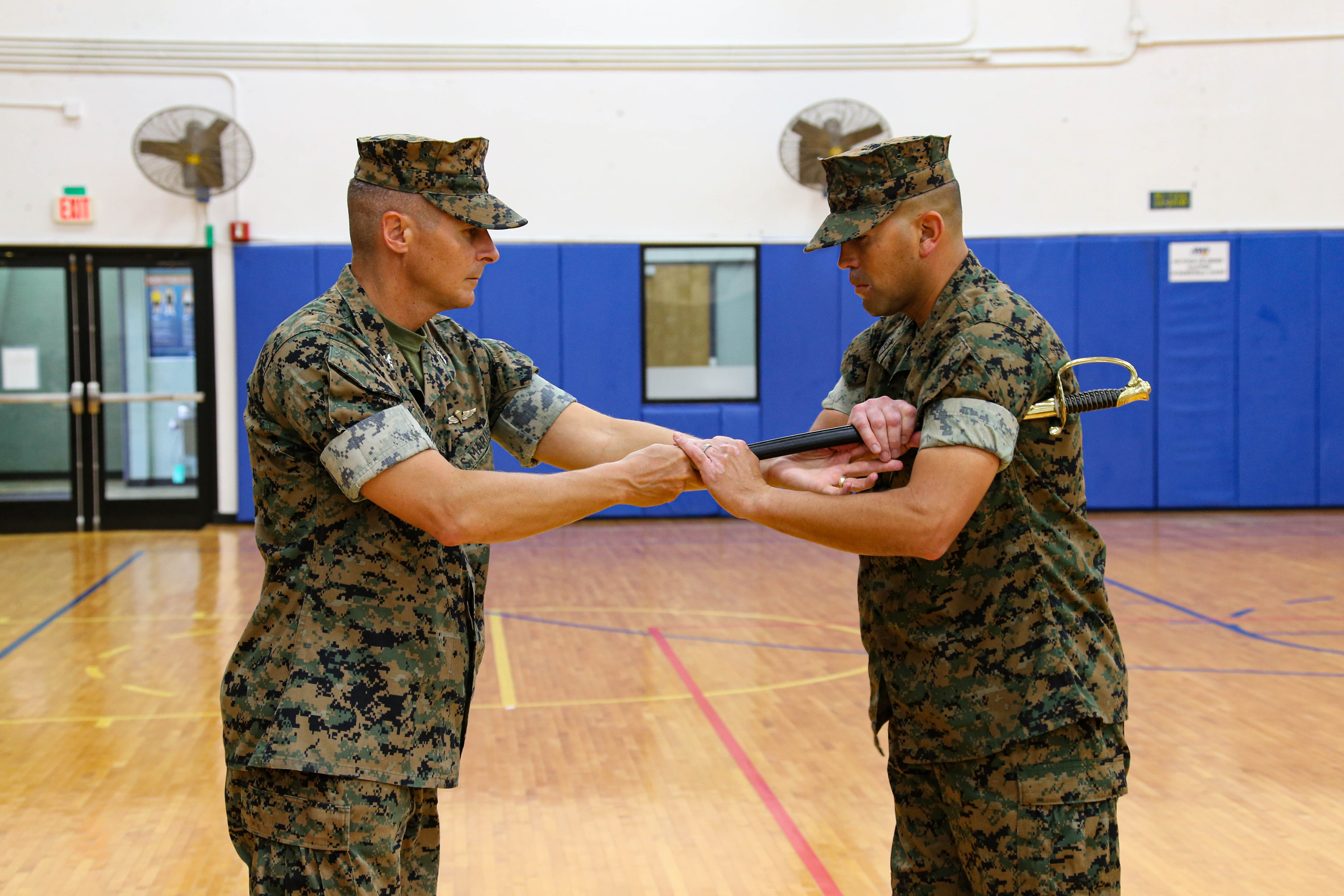 Photo of sword of office passing