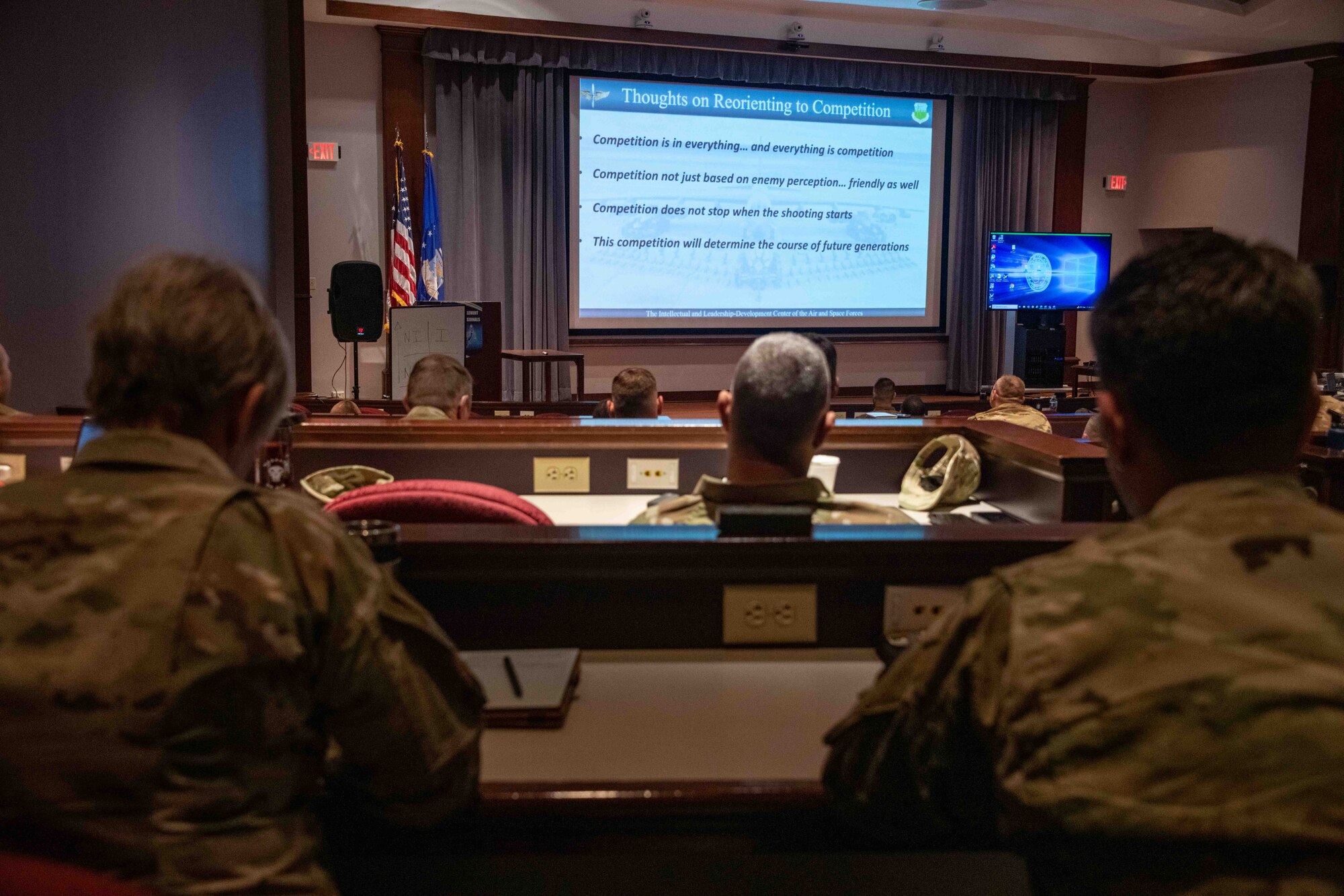 Air Education and Training Command’s newest chief master sergeants receive a virtual briefing on strategic competition on the first day of the weeklong Chiefs Orientation course at Air University, Maxwell Air Force Base, Alabama, Feb. 13, 2023. The Combat Air Forces chair at Air University, Col. Scott Hoffman, briefed the 51 new senior enlisted leaders.