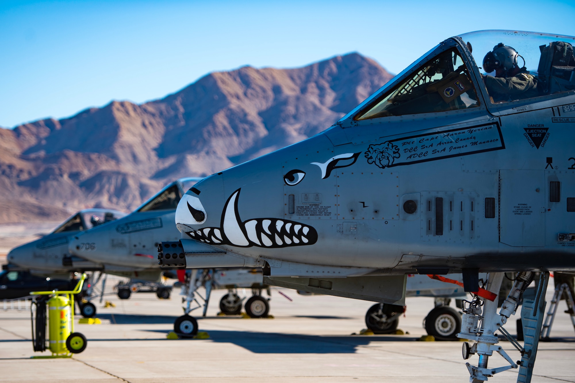 A trio of A-10C Thunderbolt II aircraft go through final checks as they prepare for a Red Flag-Nellis 23-1 exercise on Nellis Air Force Base, Nevada, Jan. 25, 2023. The A-10C are simple, effective and survivable twin-engine jet aircrafts that can be used against light maritime attack aircraft and all ground targets, including tanks and other armored vehicles.

(U.S. Air Force photo by Senior Airman Jon P. Anderson)