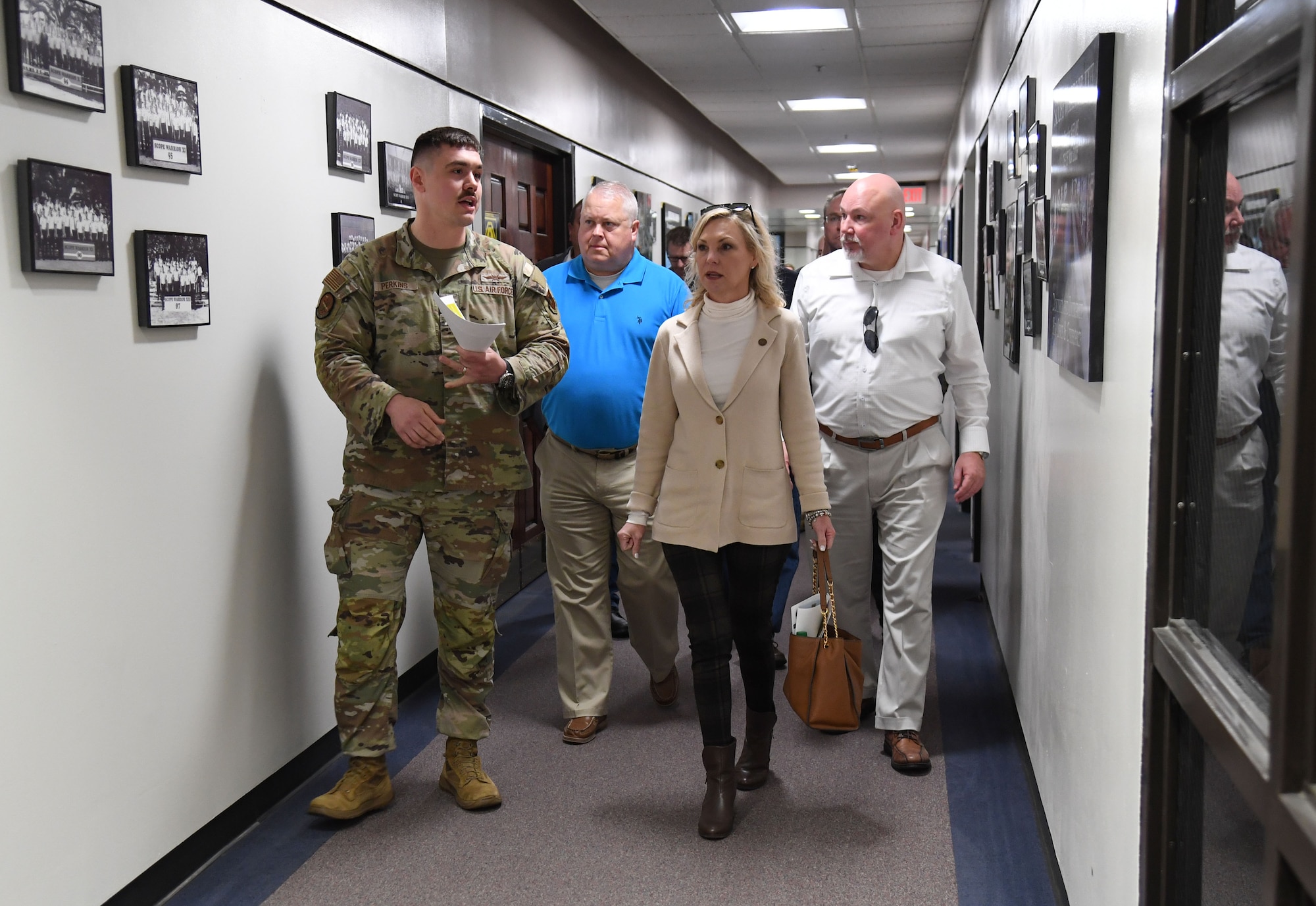 U.S. Air Force 1st Lt. Jesse Perkins, 333rd Training Squadron instructor, provides a cyber training course overview to staff members of Congressman Mike Ezell, South Mississippi 4th Congressional District representative, during an immersion tour inside Stennis Hall at Keesler Air Force Base, Mississippi, Feb. 15, 2023.