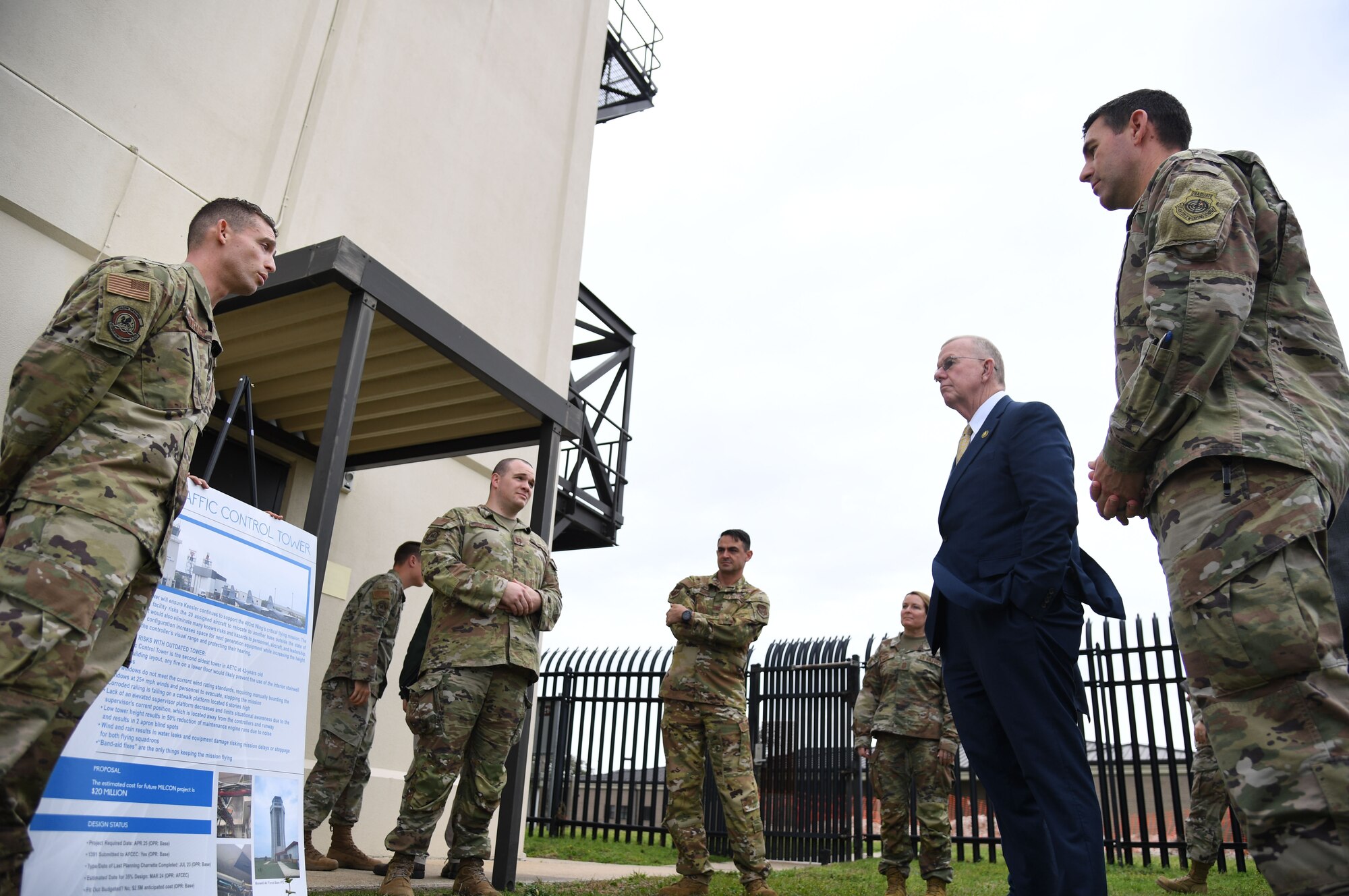 U.S. Air Force Master Sgt. Carlos Santiago, 81st Operations Support Flight tower chief controller, provides an air traffic control tower overview to Congressman Mike Ezell, South Mississippi 4th Congressional District representative, and his staff, during an immersion tour at Keesler Air Force Base, Mississippi, Feb. 15, 2023.