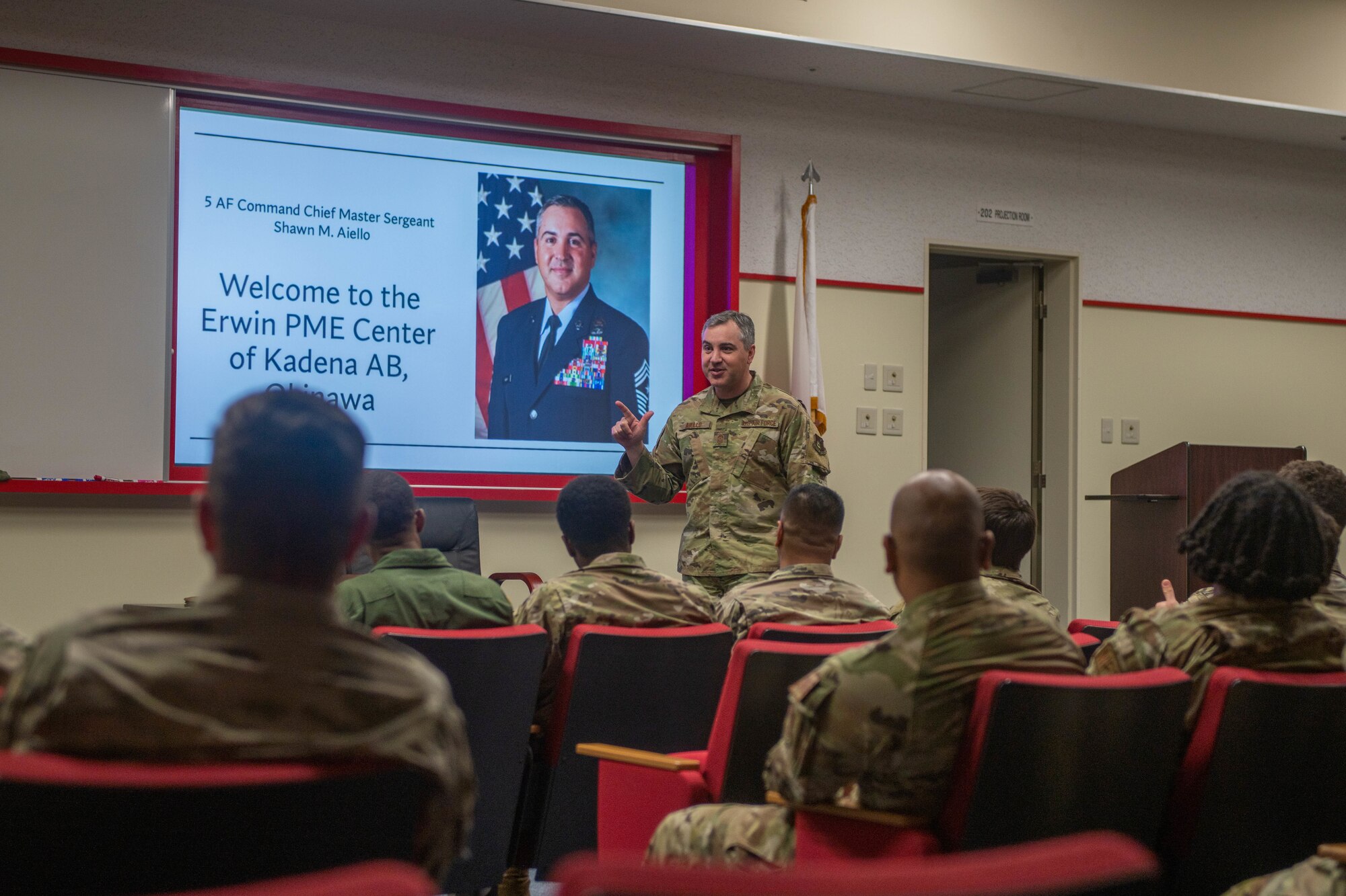 CMSgt speaks to a crowd of Airmen.