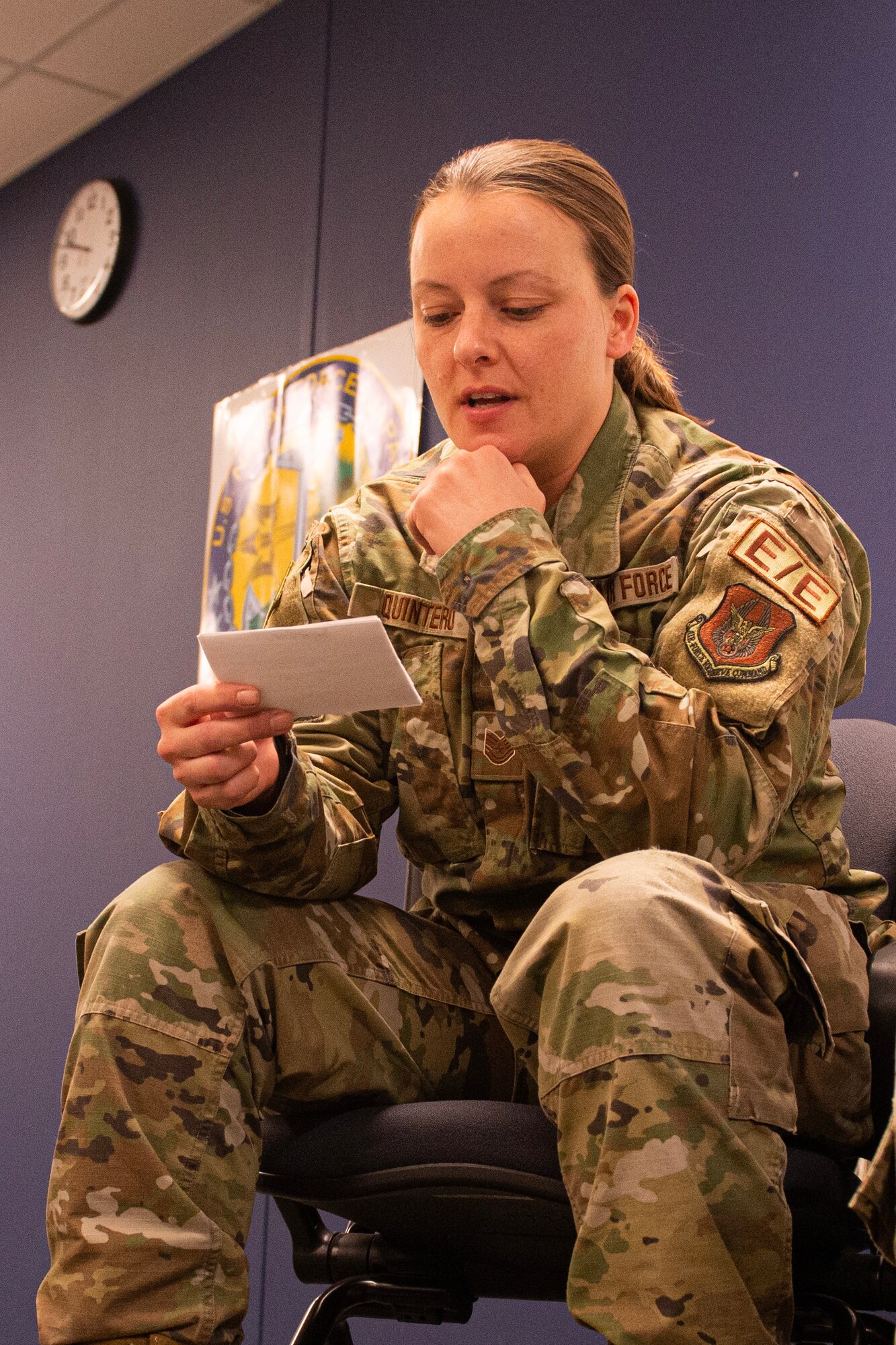 Tech Sgt. Brandi Quintero, 934th Maintenace Support Squadron electrical and environmental systems technician, reads her role during a sexual assault scenario at Minneapolis-St. Paul Air Reserve Station, Minn., Jan. 24, 2023. The 934th Airlift Wing Sexual Assault Prevention and Response Office redesigned the annual SAPR training with a roleplaying scenario.