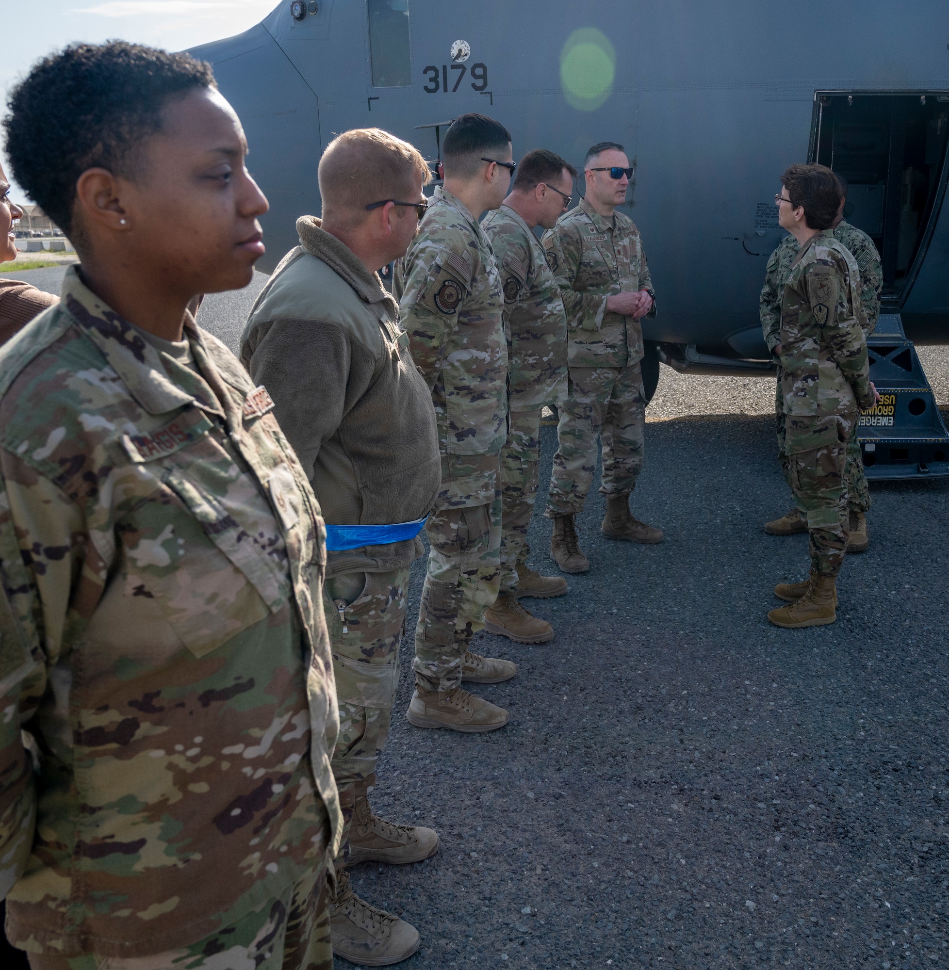 U.S. Air Force Gen. Jacqueline Van Ovost, U.S. Transportation Command commander, speaks with Airmen from the 386th Expeditionary Aircraft Maintenance Squadron at Ali Al Salem Air Base, Kuwait, Feb. 10, 2023.