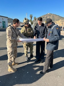 Sailors assigned to Explosive Ordnance Disposal (EOD) Mobile Unit 12 and Unidad De Buceadores Mine-Counter Measures forces review plans during exercise MAGRE 23.1, Feb. 4, 2023. The George H.W. Bush Carrier Strike Group is on a scheduled deployment in the U.S. Naval Forces Europe area of operations, employed by U.S. Sixth Fleet to defend U.S., allied, and partner interests.