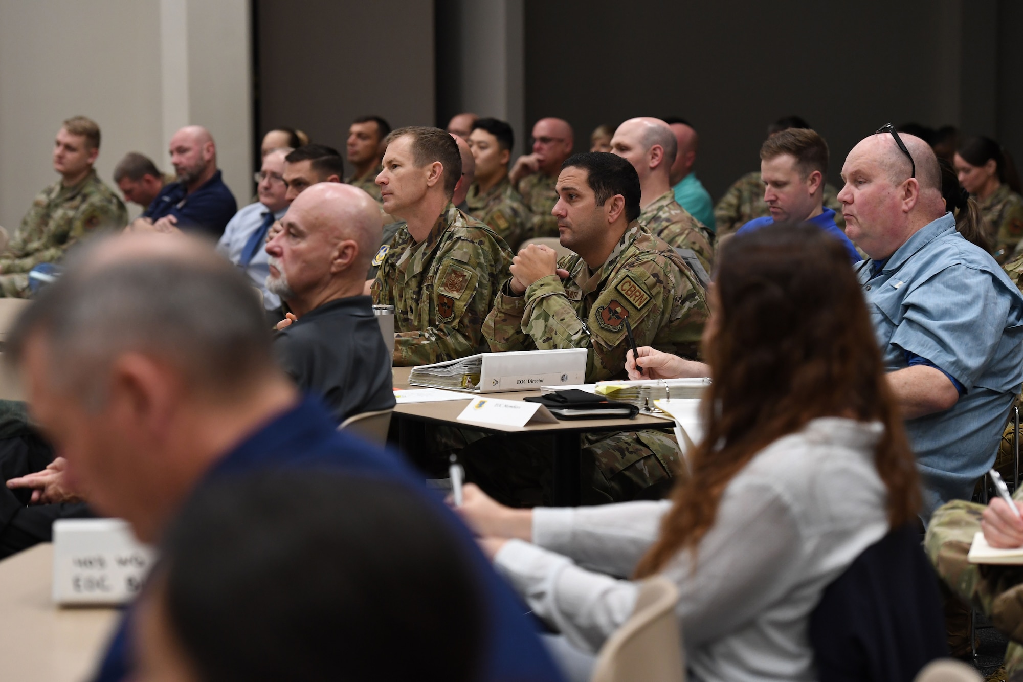 First responders from Keesler and the local communities attend a joint table top exercise inside the Roberts Consolidated Aircraft Maintenance Facility at Keesler Air Force Base, Mississippi, Feb. 16, 2023.
