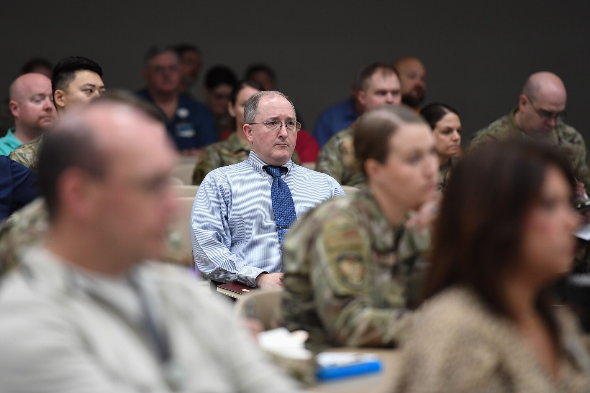 Jeffrey Frye, 81st Training Wing plans and programs chief, attends a joint table top exercise inside the Roberts Consolidated Aircraft Maintenance Facility at Keesler Air Force Base, Mississippi, Feb. 16, 2023.