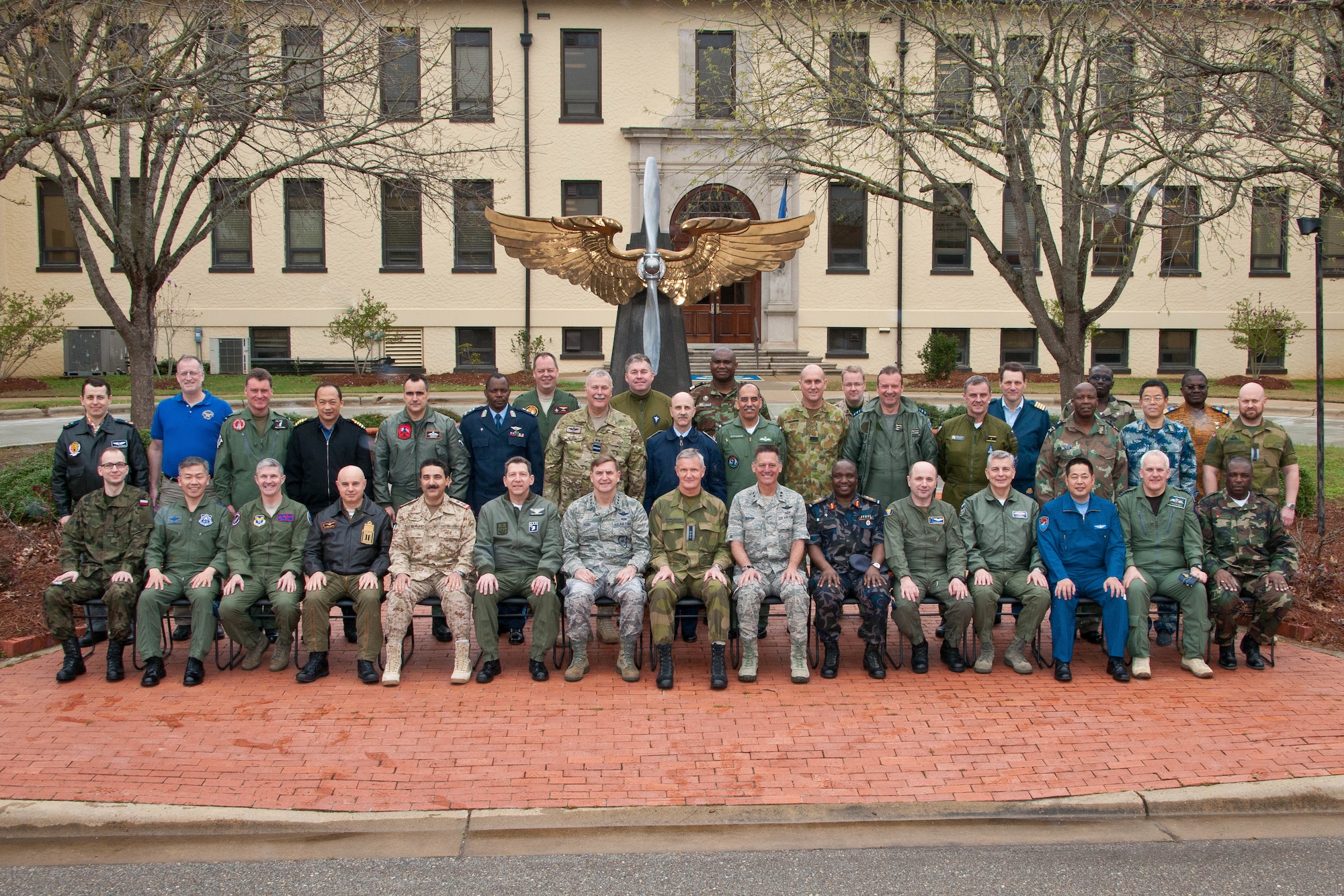 Attendees of the Air Attachés Spring Tour and host Maj. Gen. Brian Bishop, commander of Spaatz Center